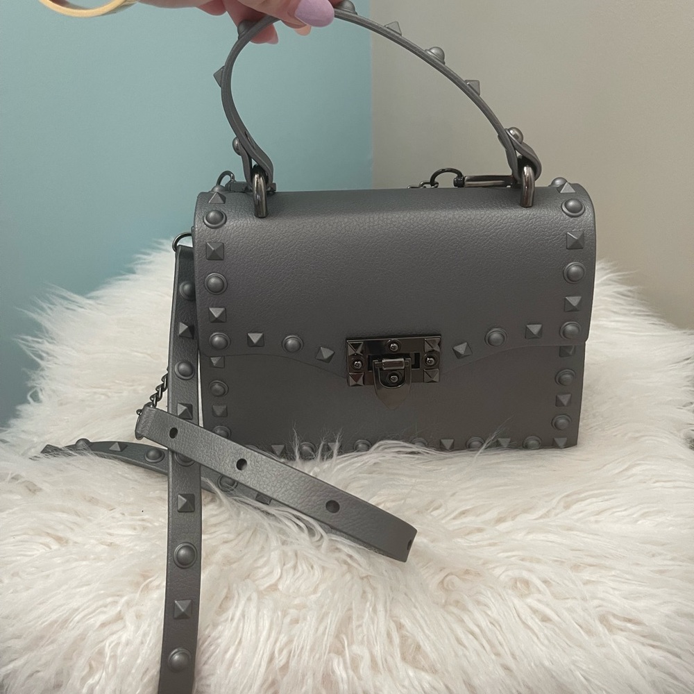 Grey studded top handle crossbody bag